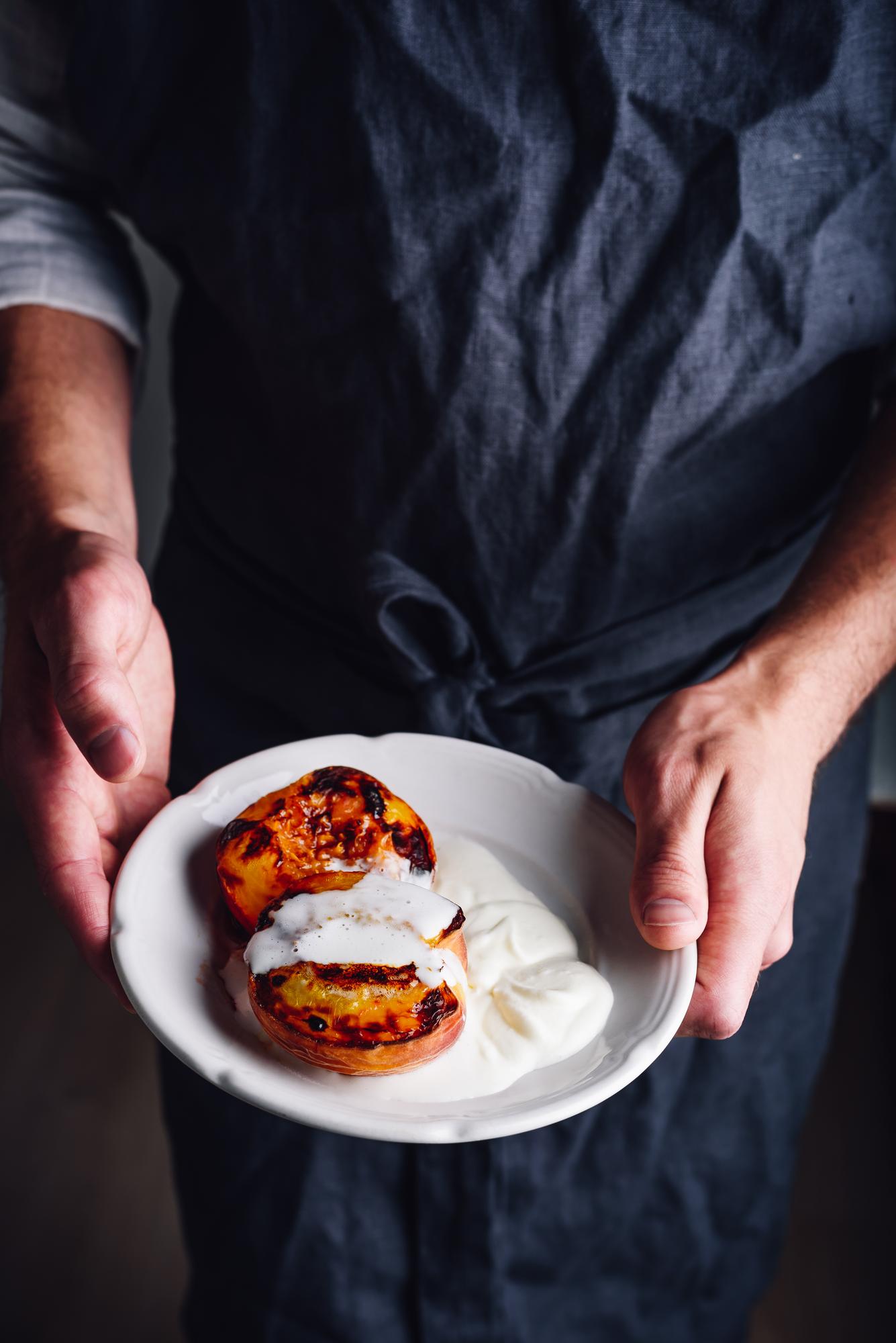 Chef demonstrating delicate plating